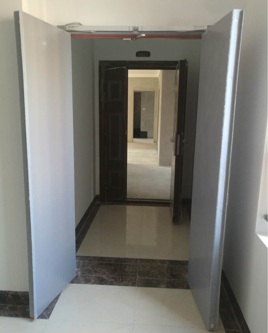 雙常開防火門電動(dòng)閉門器安裝現(xiàn)場(chǎng)圖 雙常開防火門電動(dòng)閉門器安裝現(xiàn)場(chǎng)圖